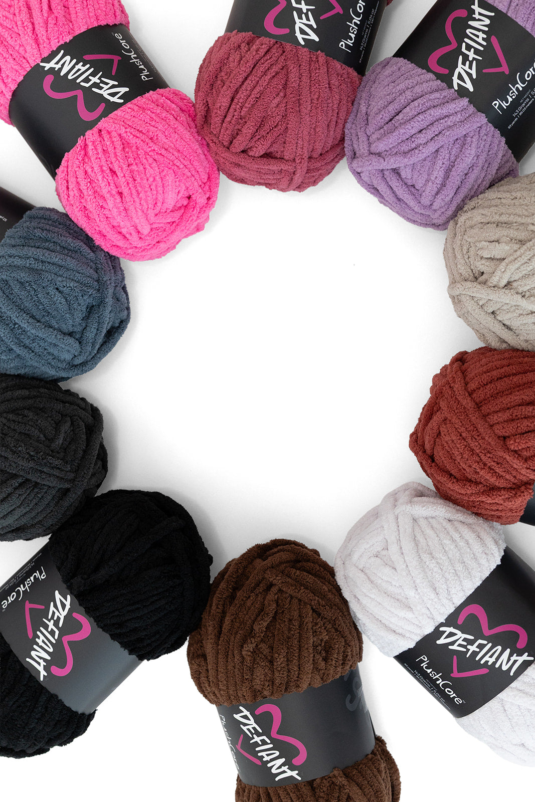 Assorted skeins of yarn in various colors with 'Defiant' labels on a white background