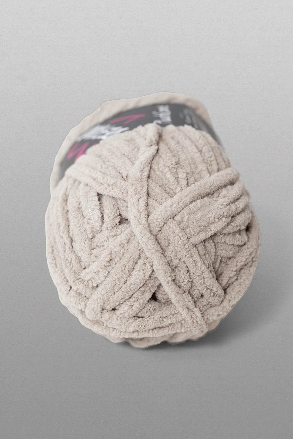 Ball of yarn on a gray background